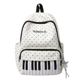 Polka dot backpack with piano keyboard print and star keychain accessory - White