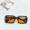 Oversized square sunglasses featuring a thick black frame and vibrant orange lenses - Black Frame Orange Lens