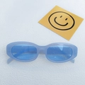 Fashionable blue oval cat-eye sunglasses with light blue lenses and resin frame - Jelly Blue