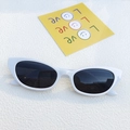 Chic cat eye sunglasses with glossy white frames and dark lenses for a retro fashion look - Porcelain White