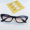 Cat eye sunglasses with black plastic frames and pink gradient lenses for fashion style - Black Frame with Blush Pink Lens