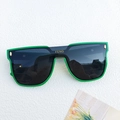 Oversized bright green frame sunglasses with dark lenses and gold decorative rivets - Green