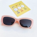 Retro small cat-eye sunglasses in apricot pink with wide temples and dark grey lenses - Pink
