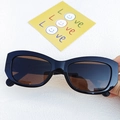 Retro black cat-eye sunglasses with brown tinted lenses and stylish thick frames - Dark Brown
