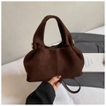 Detail of dark brown suede cloud bag with soft pleats and gold-tone hardware - Brown