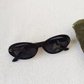 Gafas de sol ovaladas negras para niños con protección UV400 y lentes oscuras - Negro