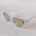 Cat eye sunglasses with light blue translucent frame and golden metal hollow decor - Jelly Blue
