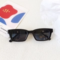 Kids square frame black sunglasses with UV400 protection on a minimalist background - Black