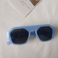 Retro geometric sunglasses with light blue oversized frame and dark hexagonal lenses - Jelly Blue