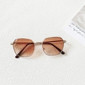 Detailed top view of gold frame geometric sunglasses with light brown gradient lenses - Gradient Tea