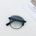 Foldable black sunglasses with blue-yellow gradient lenses in a compact portable form - Green