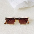 Flat lay of retro rectangle sunglasses with tortoise inner frame and gradient lenses - Champagne Tortoise Legs