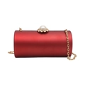 Red acrylic cylindrical evening clutch with large pearl clasp and gold chain strap - Red