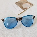 Occhiali da sole quadrati con strass blu, dettagli teschio e lenti azzurre trasparenti - Montatura Trasparente Strass Blu