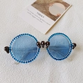 Gothic round skull sunglasses featuring blue rhinestones and transparent blue lenses - Transparent Frame Blue Rhinestones