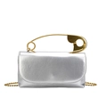 Silver leather mini crossbody bag featuring a large gold safety pin handle and chain strap - Silver