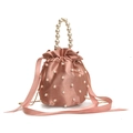 Pink satin drawstring bucket bag with pearl embellishments and a pearl top handle - Pink