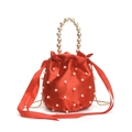 Elegant red satin bucket bag with faux pearl embellishments and a matching pearl handle - Pink