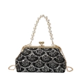 Elegant black shell evening bag with silver sequins, shell pattern, and pearl handle - Black
