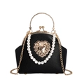 Elegante schwarze Handtasche aus Leder mit perlenbesetztem Herz und Goldgriff - Herz Schwarz