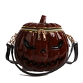 Halloween pumpkin crossbody bag in burgundy patent leather with carved face design - Red