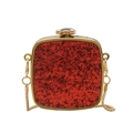 Macro detail of red sequin party clutch with gold metal frame and floral clasp - Square / Red