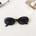 Retro oval sunglasses in classic black finish with high-gloss frame and dark lenses - Black