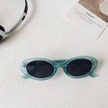 Retro oval sunglasses in transparent light blue frame with fine silver glitter sparkles - Blue
