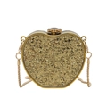 Detail of a heart-shaped evening bag with gold sequins, floral clasp and metal chain - Heart-shaped / Gold