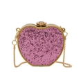 Macro shot of pink glitter apple-shaped evening bag with floral gold metal clasp and chain - Heart-shaped / Pink