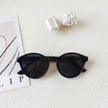 Retro black round frame sunglasses for toddlers with dark lenses and minimalist style - Black