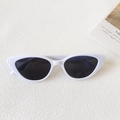 Retro cat-eye sunglasses featuring a sleek white frame and dark grey polarized lenses - White