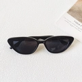 Retro black cat-eye sunglasses with dark UV400 lenses and glossy finish frame - Black