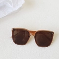 Amber square sunglasses with gradient brown lenses and star metal accents on the frame - Transparent Tea