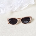 Polarized kids cat eye sunglasses in nude pink with UV400 protection and metal dots - Off White