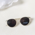 Polarized kids sunglasses featuring a matte beige frame and round dark lenses with UV400 - Transparent Light Yellow