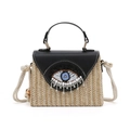 Bolso de paja tejida beige con solapa de cuero negro y bordado de ojo turco - Negro