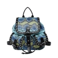 Vintage faux snakeskin backpack with rivets and blue yellow patchwork on white background - Blue
