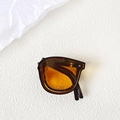 Foldable kids sunglasses with dark frames and amber lenses featuring UV400 protection - Black Frame Yellow Lens