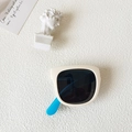 Foldable kids sunglasses featuring cream white frames and vibrant blue temples for kids - Beige Frame Blue Leg
