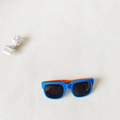 Foldable kids sunglasses in blue and orange contrast colors for outdoor UV protection - Sky Blue Orange Leg