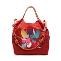 Red nylon tote bag with artistic apple embroidery and woven rope handles on white background - Red