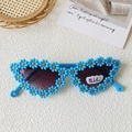 Blue cat-eye children's sunglasses featuring cute daisy floral decor and UV400 lenses - Cat Eye Blue