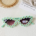 Mint green flower sunglasses for kids with daisy petal frames and UV400 protection - Cat Eye Green