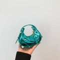 Mini metallic green crescent handbag with glossy finish and gold zipper detail - Green