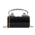 Chic black acrylic evening bag with silver lion head handle and gold chain strap - Black