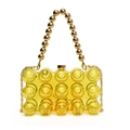 Borsa da sera gialla in acrilico trasparente con texture a sbalzo e manico dorato - Giallo