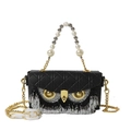 Black quilted crossbody bag with owl emblem, pearl handle, and bead tassel detail - Black with Black and White Crystal