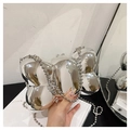 Detail of silver metallic bow evening bag with beaded chain and mirror finish surface - Mirror Silver / Modern Bowknot Style