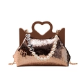 Rose gold sequined shoulder bag featuring a heart-shaped handle and pearl charm strap - Champagne